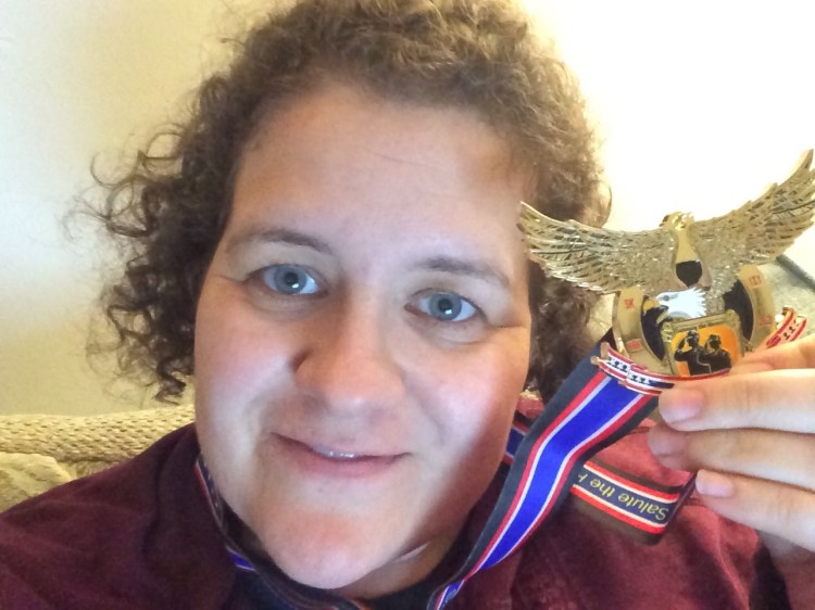 Jodi with running medal